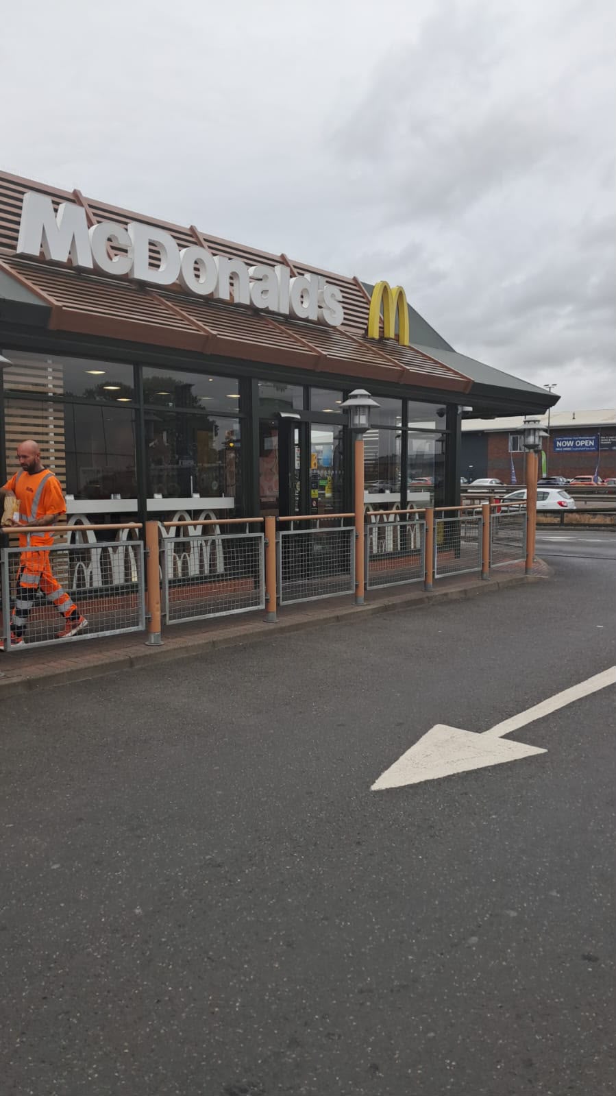 McDonald's restaurant exterior, with the sign and the glass front